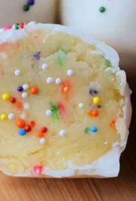 No-Bake Cake Batter Truffles topped with colorful sprinkles.