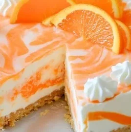 No-bake orange creamsicle cheesecake topped with orange zest