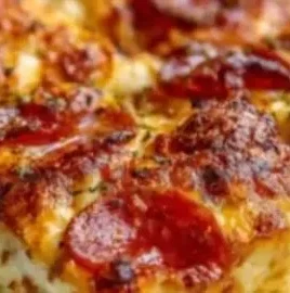 Delicious Pizza Cottage Cheese Bake served in a dish with fresh toppings