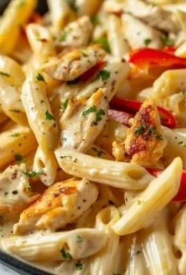 Plate of Rattlesnake Pasta with chicken and spicy cream sauce