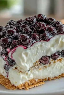 Slice of refreshing blueberry lemonade icebox cake on a plate