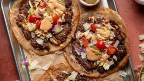 Delicious Smash Burger Tacos with special sauce on a plate