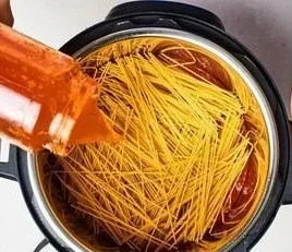 Cooking spaghetti in an Instant Pot for quick meal preparation